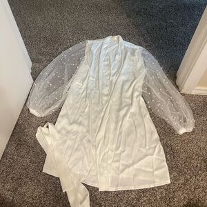 The robe size X-Small with pearls